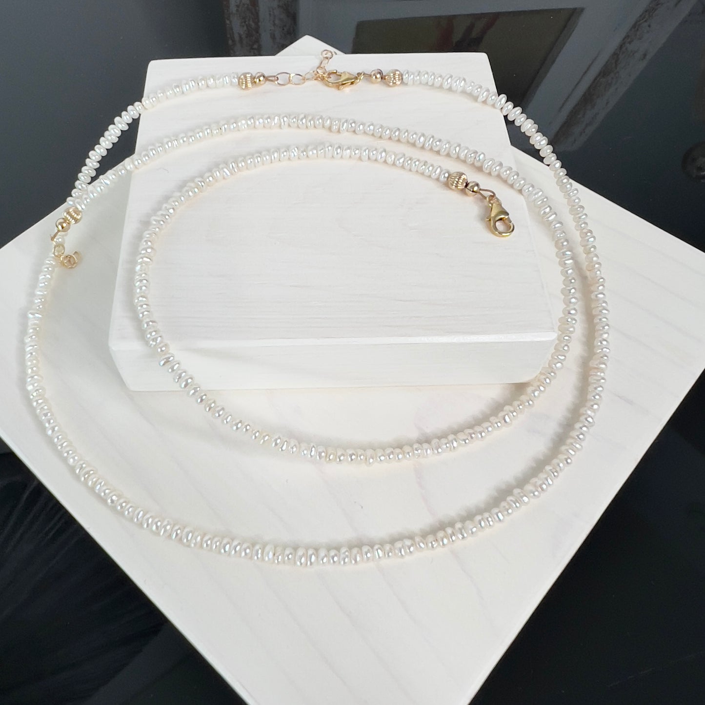 the CAIDI- Freshwater Seed Pearl Choker