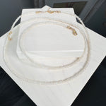 the CAIDI- Freshwater Seed Pearl Choker