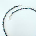 the NELLIE- Black Peacock Seed Pearl Choker